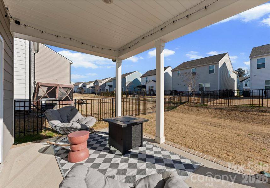 Exterior details and patio area of a home in Scotch Meadows, Monroe (Image 20).