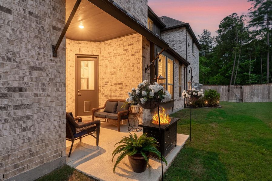 Enjoy evenings out with a firepit by the covered patio -