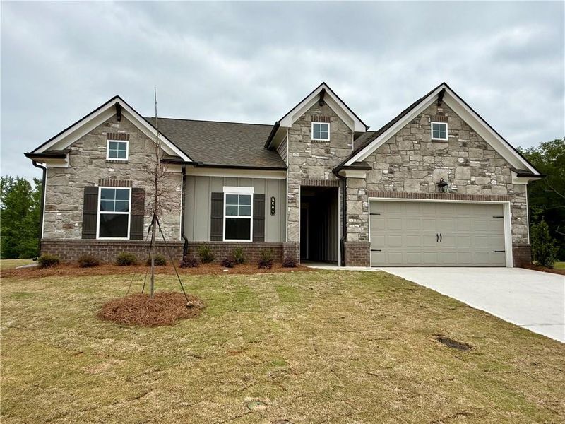 Front exterior of a new home in Ponderosa Farms Reserve, Gainesville, GA, highlighting curb appeal (Image 23). Front exterior of a new home in Ponderosa Farms Reserve, Gainesville, GA, highlighting curb appeal (Image 23).