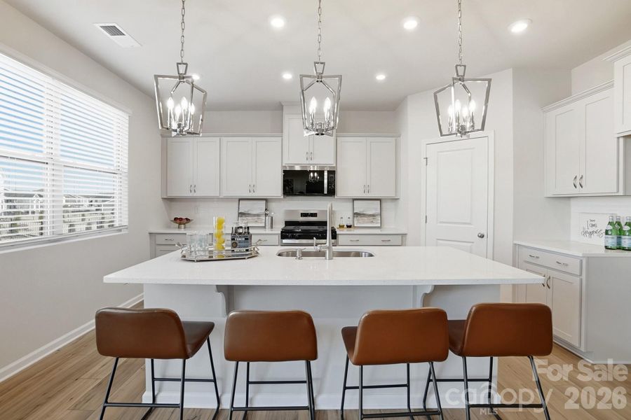 Furnished interior view inside a new home in Waxhaw Landing, Monroe (Image 8).