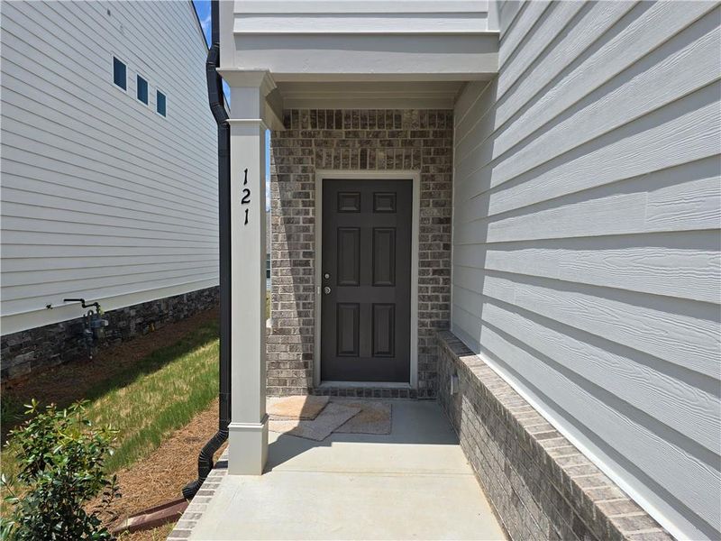 Front exterior of a new home in Enclave at Dawson Forest, Dawsonville, GA, highlighting curb appeal (Image 2).