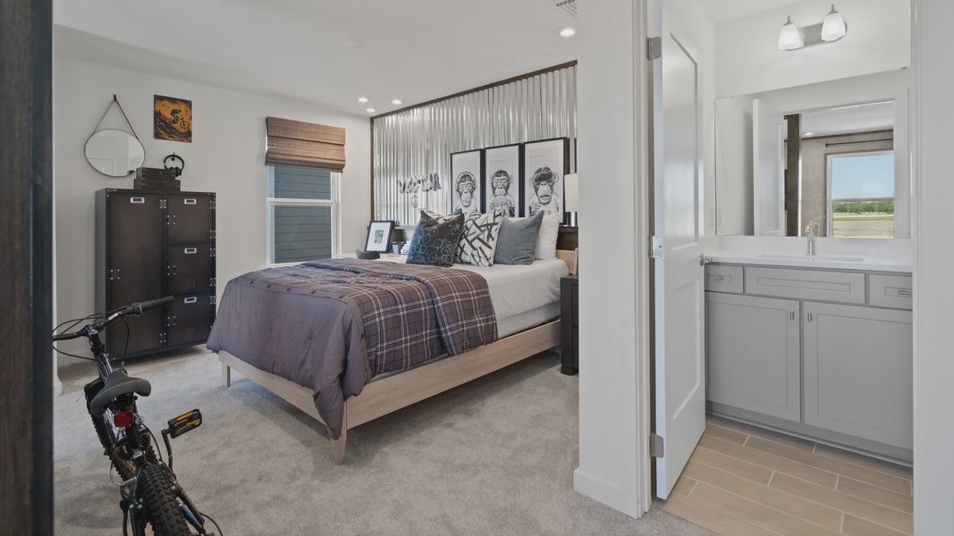 Above garage retreat space with full bathroom in a DRB Homes Ambersweet model at the Trinity Place community. Above garage retreat space with full bathroom in a DRB Homes Ambersweet model at the Trinity Place community.