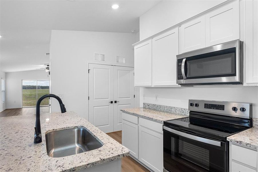 Furnished interior view inside a new home in Trilby Crossing, Brooksville (Image 6).