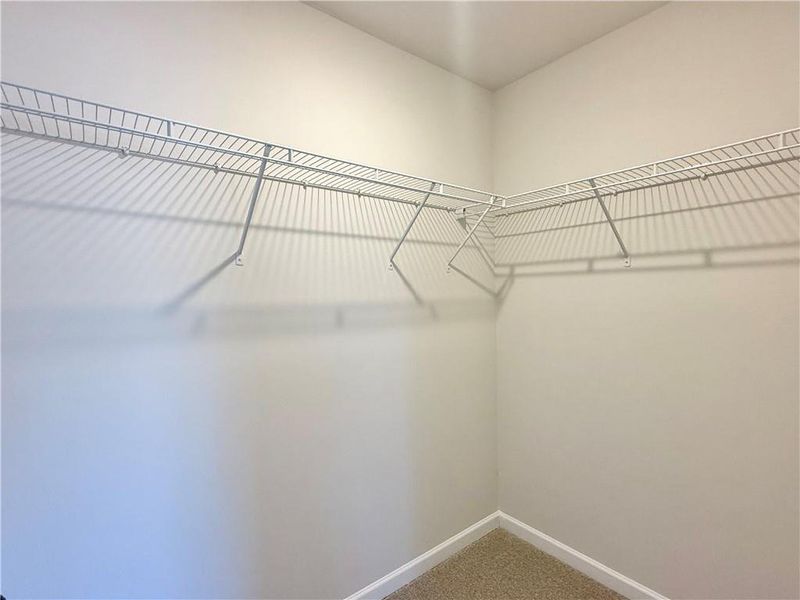 Spacious, unfurnished interior of a new home in Vines at Mill Creek - Estate Series, Braselton (Image 24).