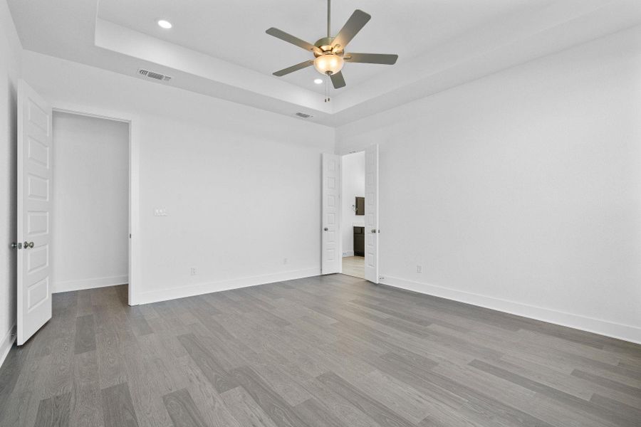 Primary Bedroom with tray ceiling