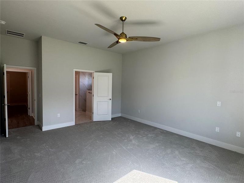Spacious, unfurnished interior of a new home in Laureate Village, Newberry (Image 34).