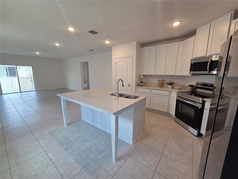 Furnished interior view inside a new home in Villamar, Winter Haven (Image 9). Furnished interior view inside a new home in Villamar, Winter Haven (Image 9).