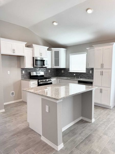 Representative furnished interior of a home built from the Madison 1487 SSC by Saratoga Homes in Crossland, El Paso (Image 3).