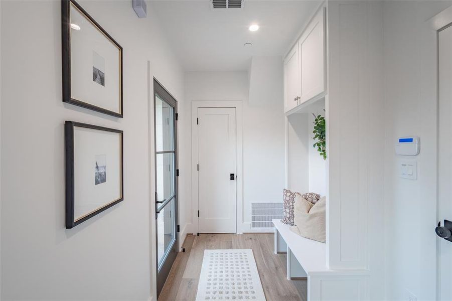 Mudroom featuring light hardwood / wood-style floors