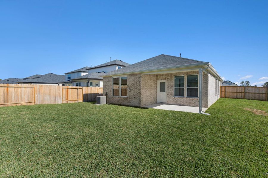 Exterior details and patio area of a home in Montgomery Bend, Montgomery (Image 4).