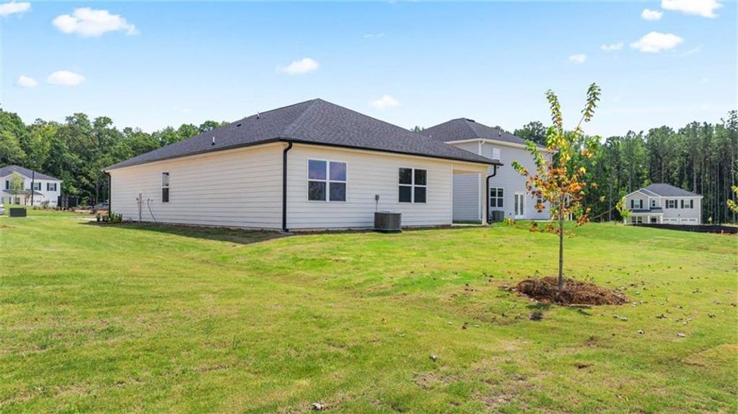 Exterior details and patio area of a home in Oakchase at Hampton, Hampton (Image 2).