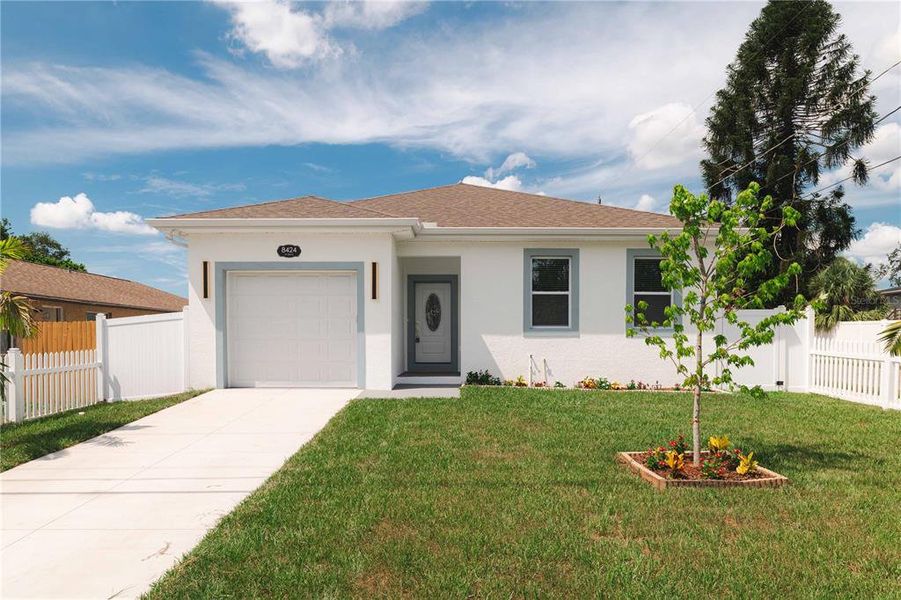 Front exterior of a new home in , Tampa, FL, highlighting curb appeal (Image 23). Front exterior of a new home in , Tampa, FL, highlighting curb appeal (Image 23).