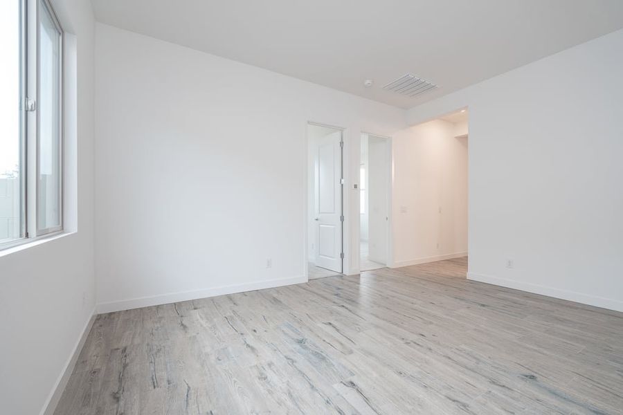 Spacious, unfurnished interior of a new home in Revana at Soleo, San Tan Valley (Image 22).