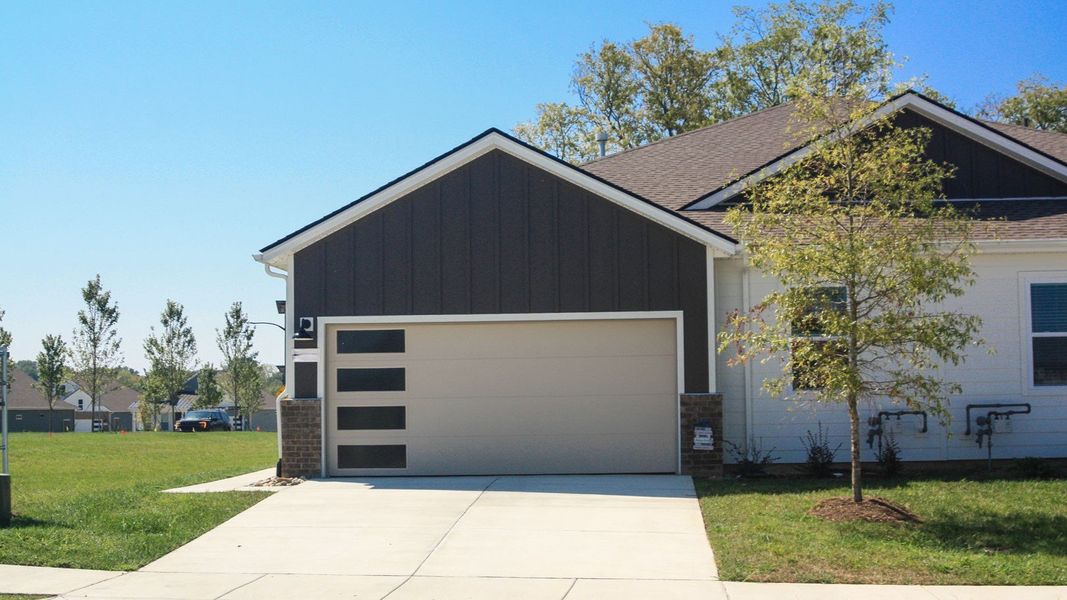 Front exterior of a new home in Nexus South, Gallatin, TN, highlighting curb appeal (Image 24).