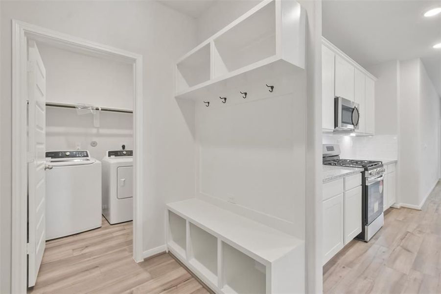 Furnished interior view inside a new home in Lakes at Black Oak, Magnolia (Image 39).