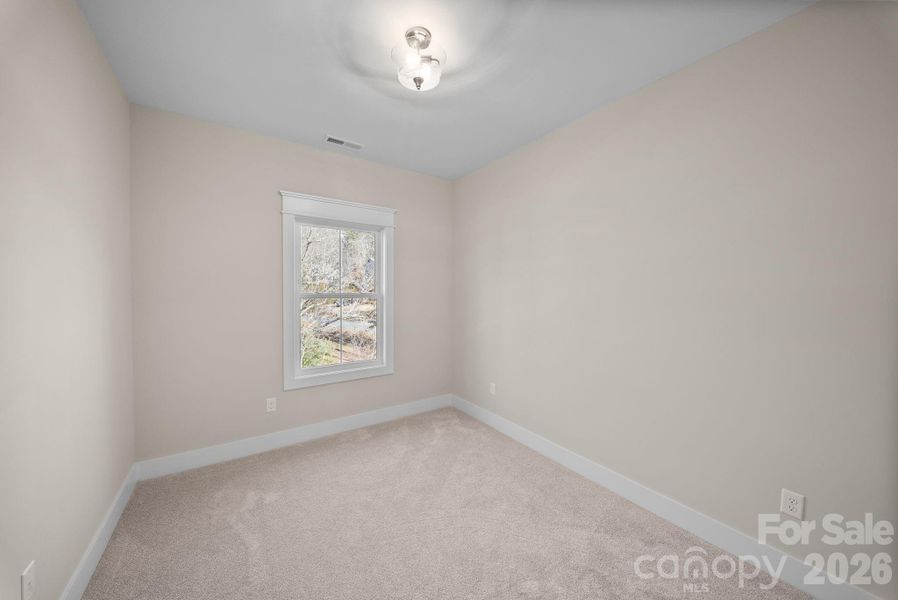 Spacious, unfurnished interior of a new home in , Asheville (Image 24).