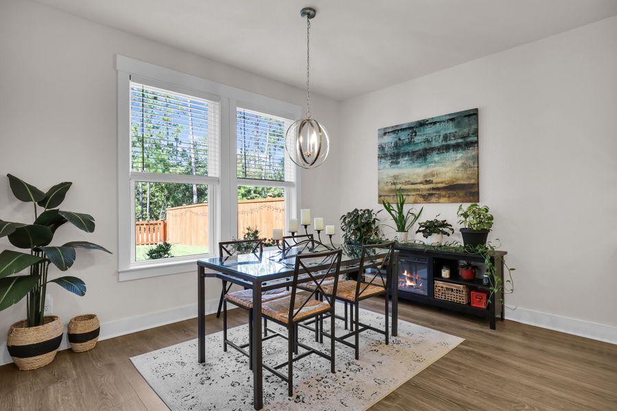 Furnished interior view inside a new home in Jasmine Point at Lakes of Cane Bay, Summerville (Image 3).