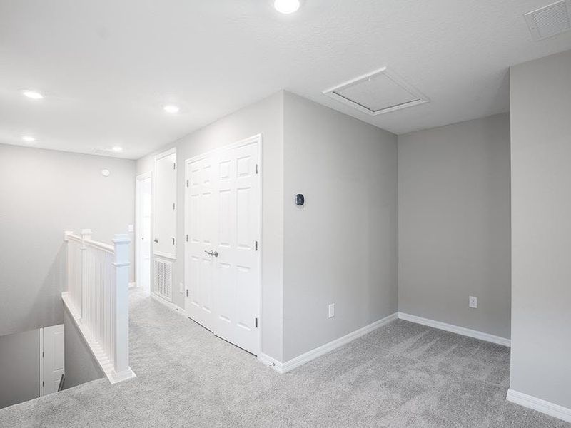 And upstairs, a flex-use loft - Capri bungalow by Highland Homes