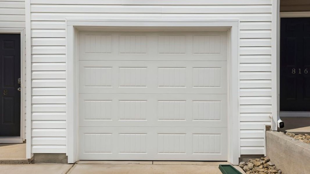 Exterior details and patio area of a home in Tanglewood Townes, Greenville (Image 3).
