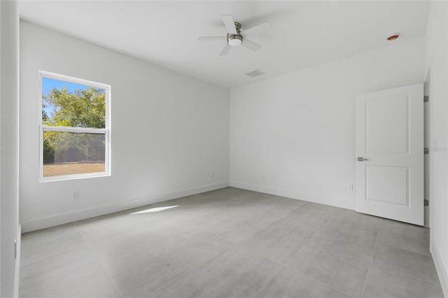 Spacious, unfurnished interior of a new home in , Port Charlotte (Image 23).