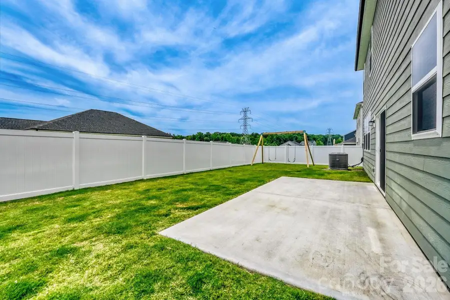 Exterior details and patio area of a home in , Midland (Image 25).