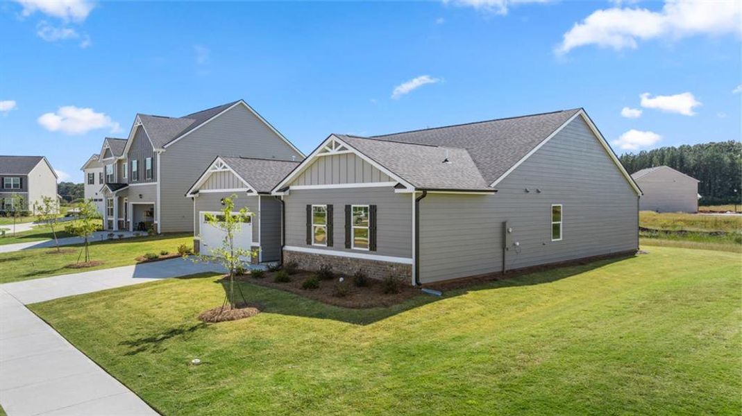 Front exterior of a new home in Preserve at Dove Creek, Statham, GA, highlighting curb appeal (Image 25).