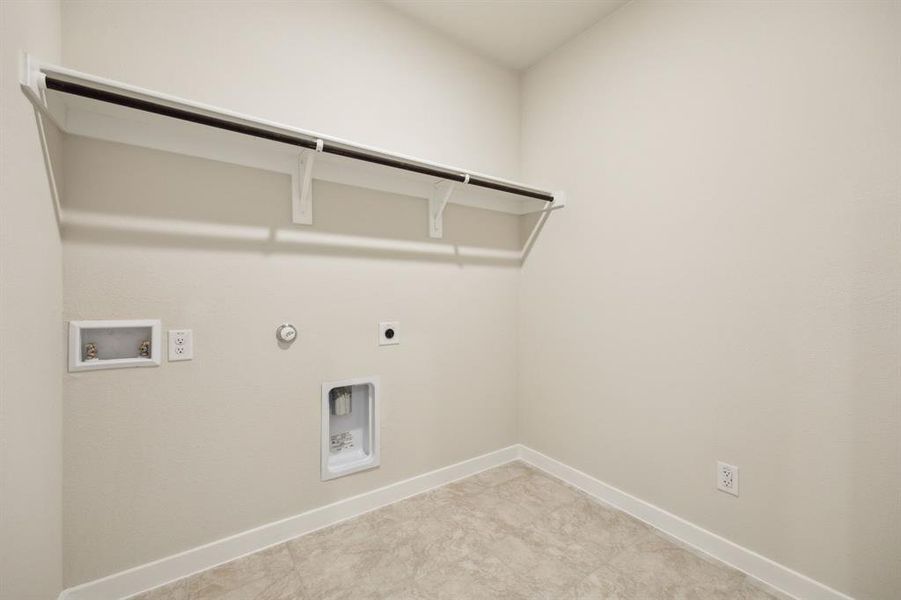 Laundry room with open storage