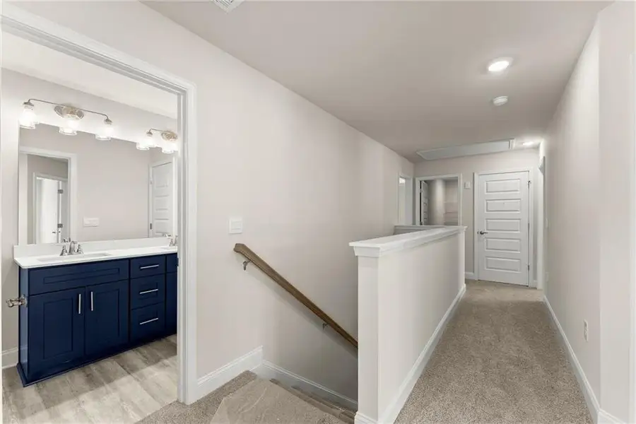 Furnished interior view inside a new home in Magnolia Villas, Cornelia (Image 9).