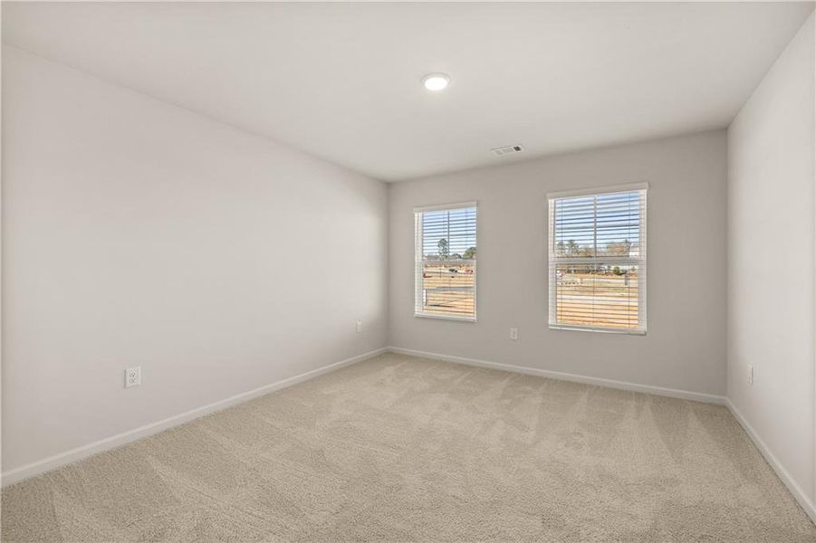 Spacious, unfurnished interior of a new home in Lake Carlton, Loganville (Image 29).