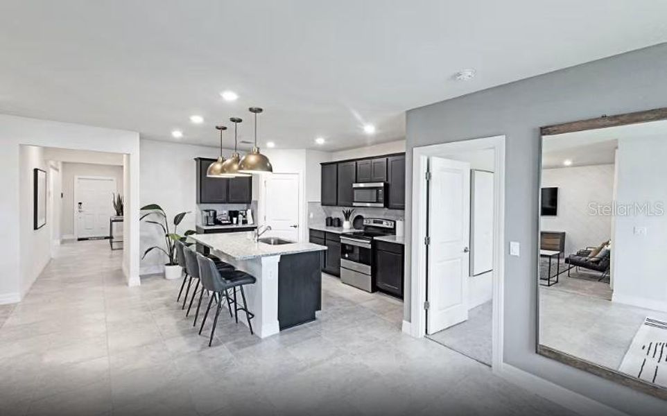 Furnished interior view inside a new home in Lakespur Wellen Park, Venice (Image 6).