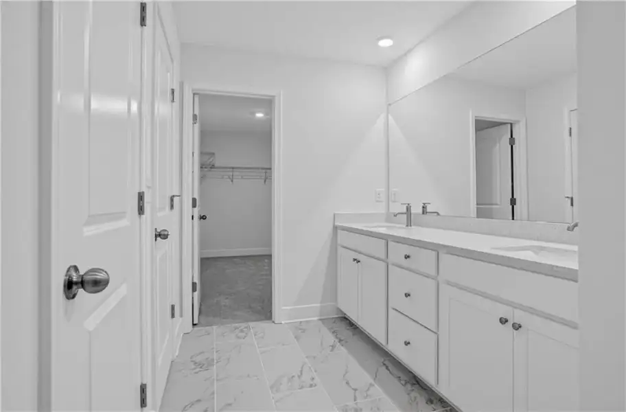 Furnished interior view inside a new home in Towns at Holly Springs, Holly Springs (Image 8).