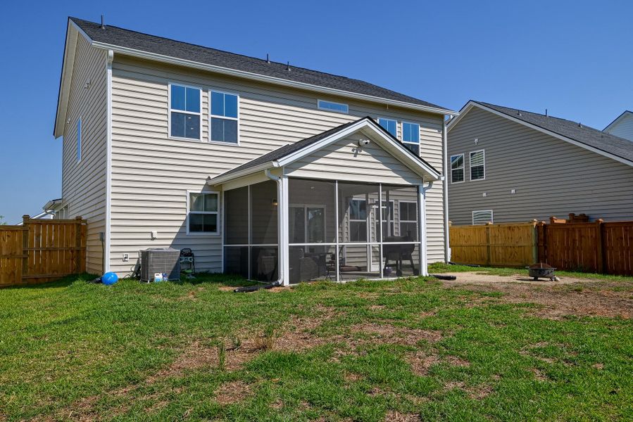 Exterior details and patio area of a home in Heron's Walk at Summers Corner, Summerville (Image 26).