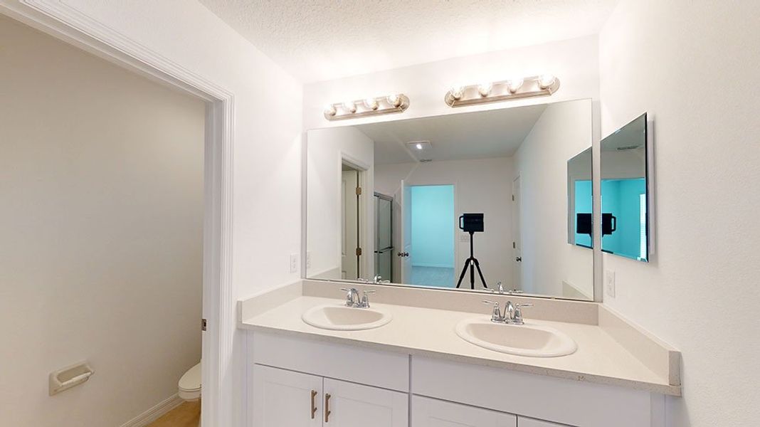 Representative furnished interior of a home built from the Azalea by Taylor Morrison in Riverfront, Edgewater (Image 8).