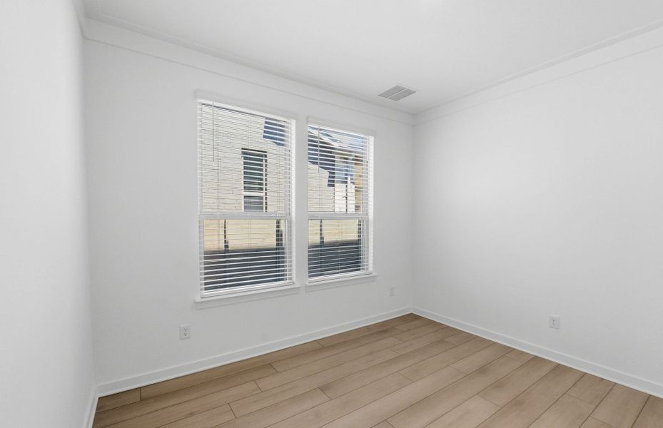 Spacious, unfurnished interior of a new home in Wolf Ranch, Georgetown (Image 46).