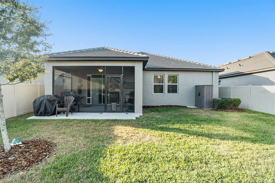 Exterior details and patio area of a home in Angeline Active Adult: Active Adult Manors, Land O' Lakes (Image 24).