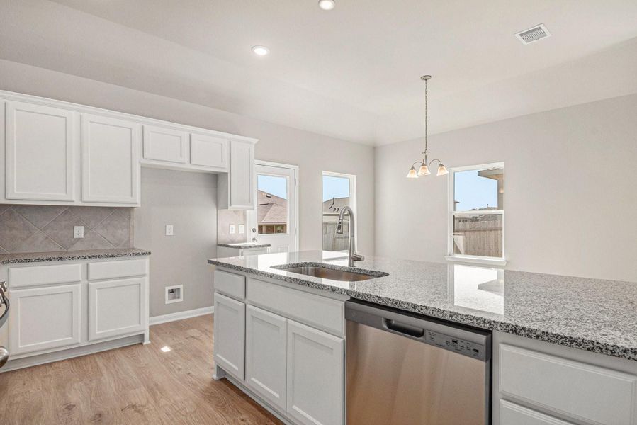 Furnished interior view inside a new home in Clear View Estates, Willis (Image 3).