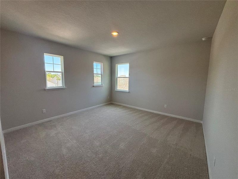 Spacious, unfurnished interior of a new home in Reserve East, Flagler Beach (Image 10).