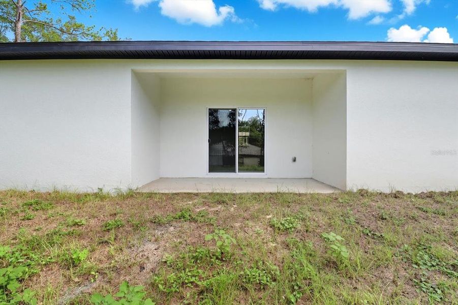 Front exterior of a new home in , Citrus Springs, FL, highlighting curb appeal (Image 17).