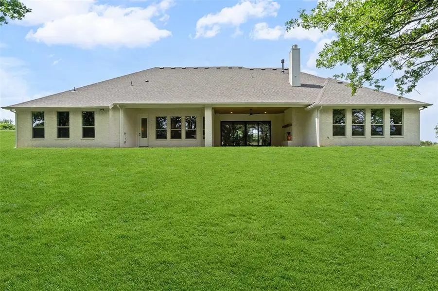 Exterior details and patio area of a home in , Weatherford (Image 3).