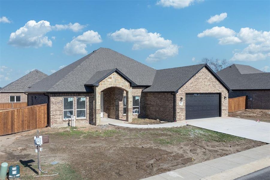 Front exterior of a new home in , Mabank, TX, highlighting curb appeal (Image 5). Front exterior of a new home in , Mabank, TX, highlighting curb appeal (Image 5).