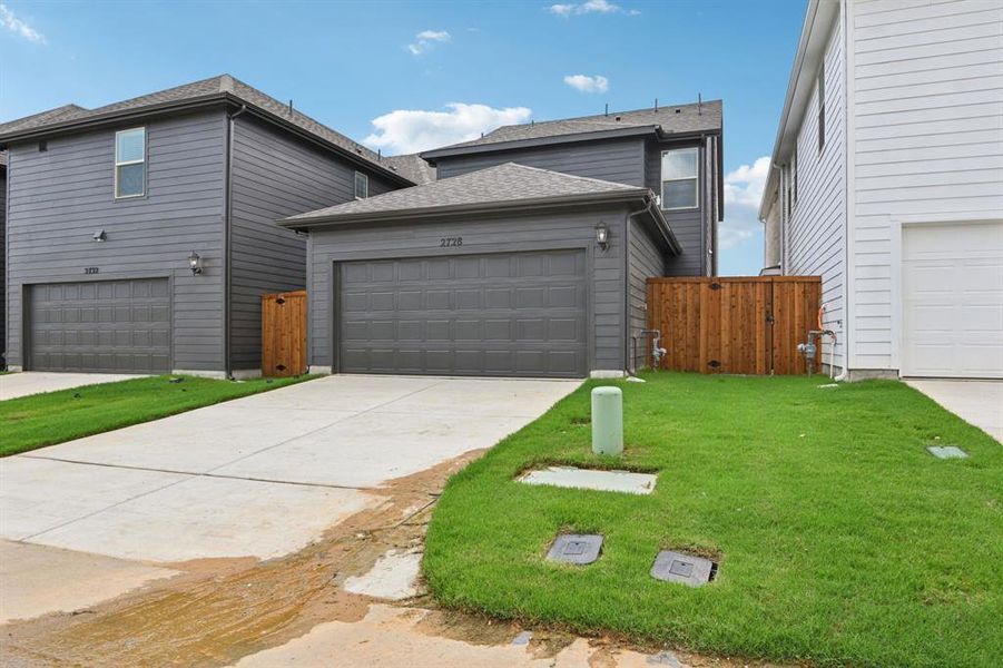 Front exterior of a new home in Ashford Park - Cottage Series, Corinth, TX, highlighting curb appeal (Image 25).