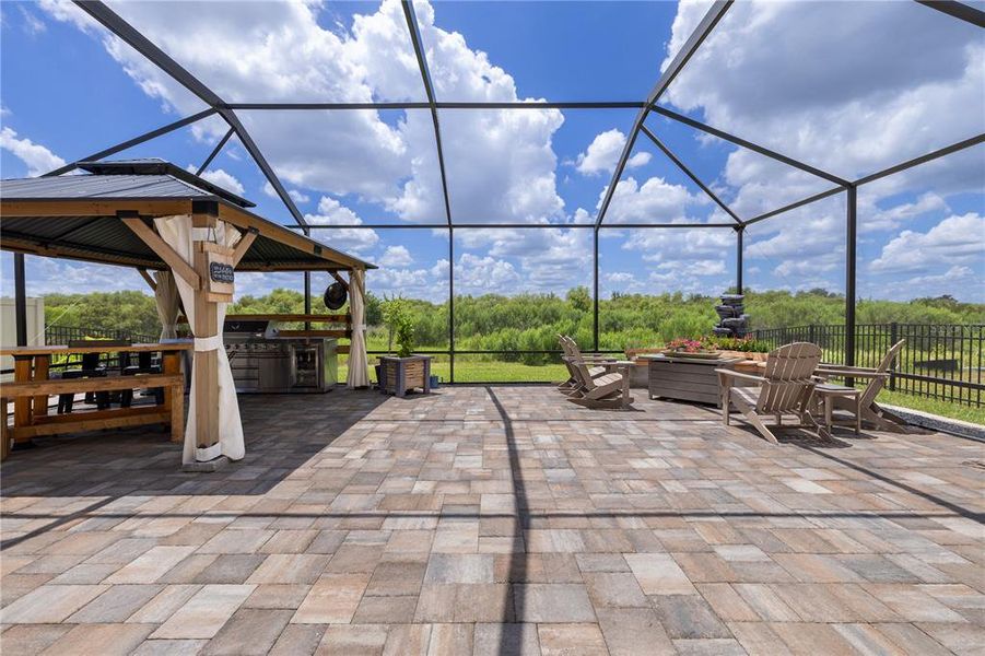 Exterior details and patio area of a home in Farm at Varrea, Plant City (Image 32).