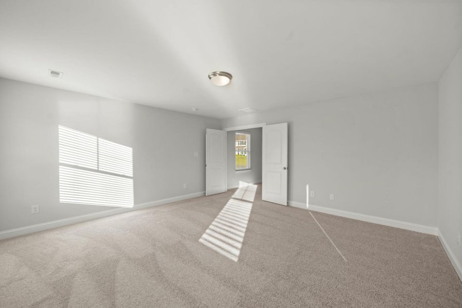Spacious, unfurnished interior of a new home in Cottages at Piper Village, Trinity (Image 37).