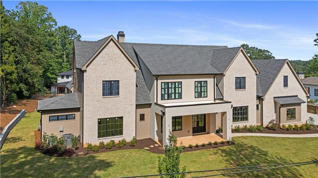 Front exterior of a new home in , Suwanee, GA, highlighting curb appeal (Image 28). Front exterior of a new home in , Suwanee, GA, highlighting curb appeal (Image 28).
