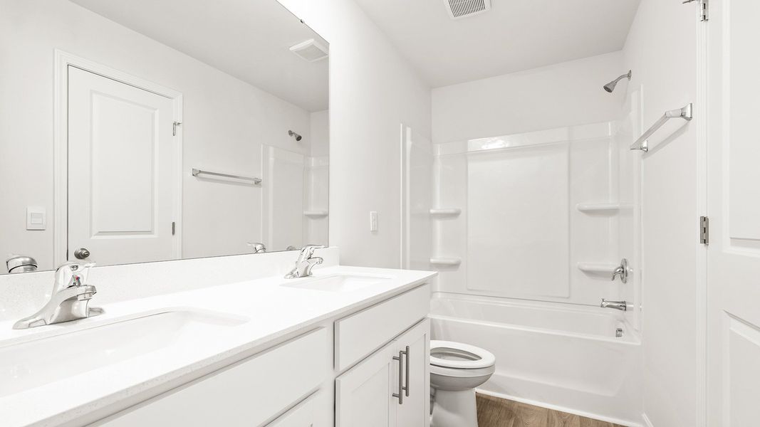 Furnished interior view inside a new home in Greystone North, Stoneville (Image 7).