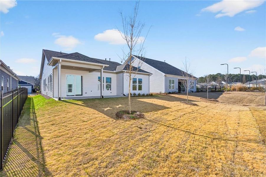 Exterior details and patio area of a home in The Reserve at Bells Ferry, Kennesaw (Image 21).