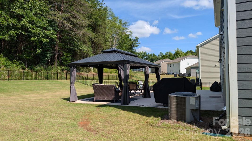 Exterior details and patio area of a home in Sanders Ridge, Troutman (Image 3).