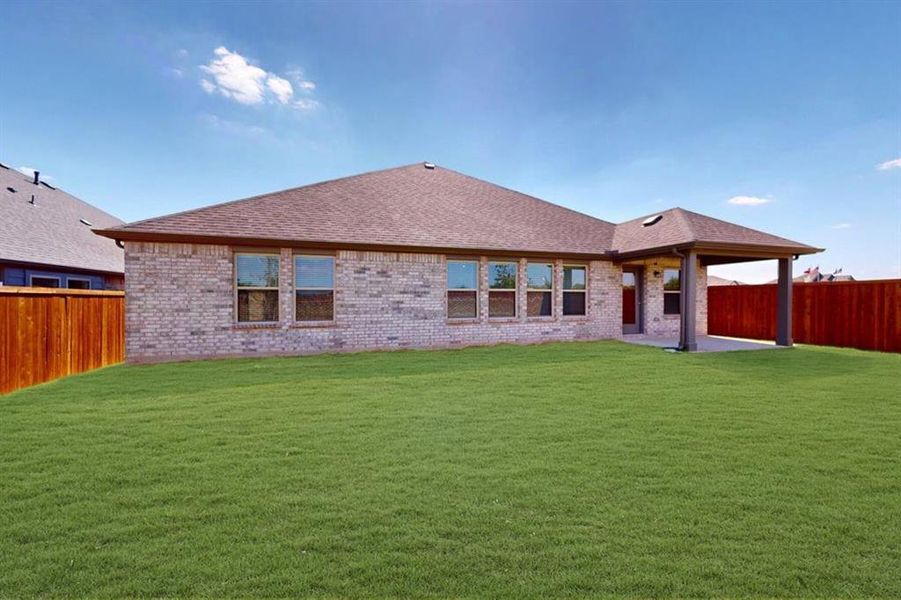 Exterior details and patio area of a home in The Preserve, Justin (Image 4). Exterior details and patio area of a home in The Preserve, Justin (Image 4).
