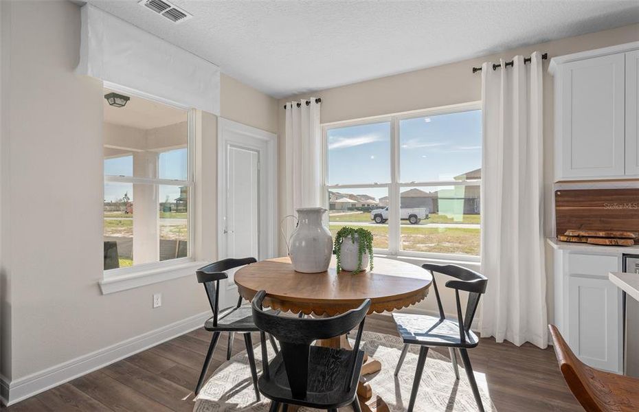 Furnished interior view inside a new home in Tohoqua, Kissimmee (Image 28).