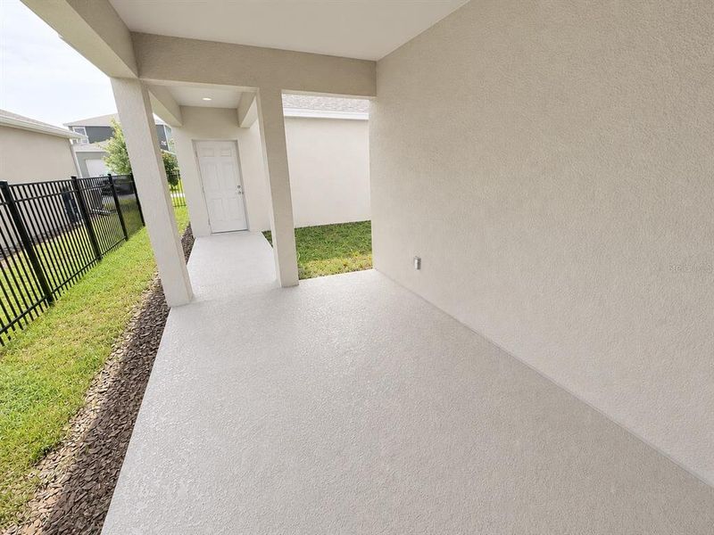 Exterior details and patio area of a home in Winding Meadows, Apopka (Image 3).